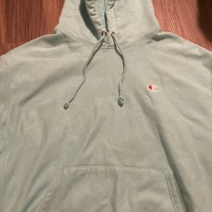 big champion sweater, feels amazing to put on! a cute turquoise pastel sweater!